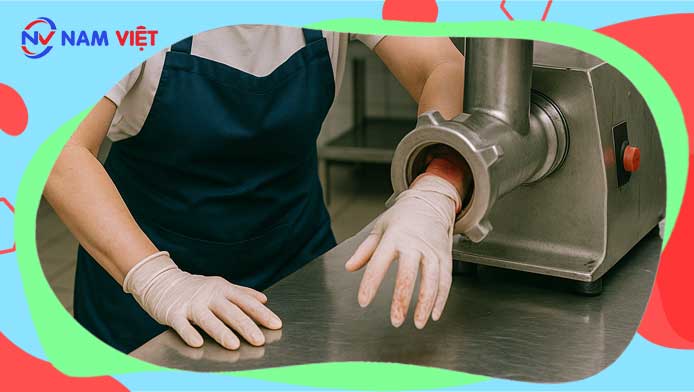 Woman’s hand caught in meat grinder